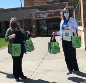 MTN staff members deliver NDLM treats