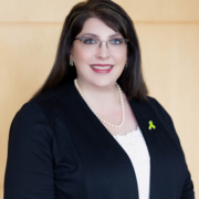 Professional portrait image of Sarah Oland.
