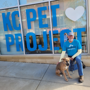 Fred Harper with KC Pet Project dog who is available for adoption. 