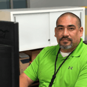 A man sitting at a computer.